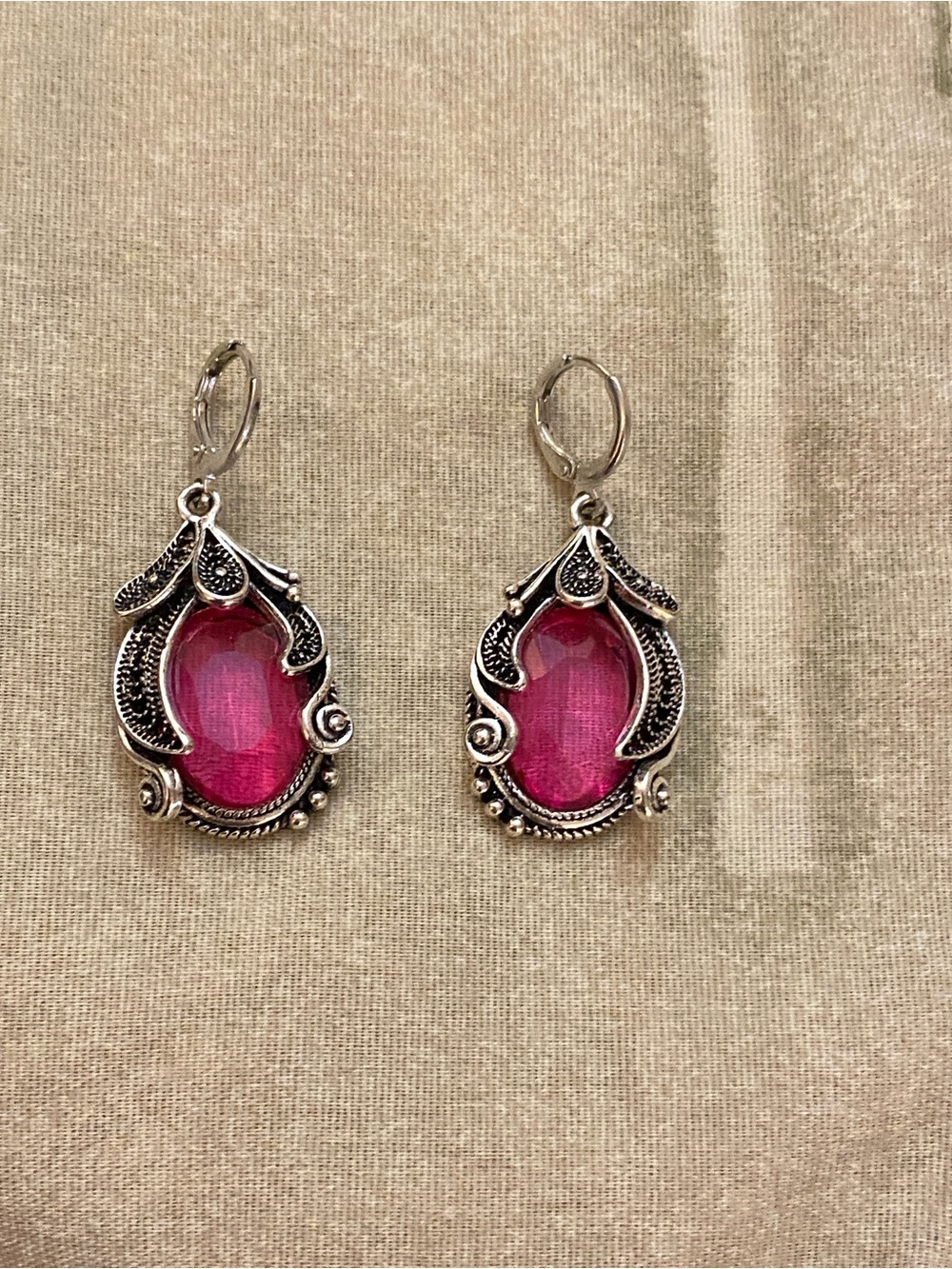 Earrings featuring Gorgeous Scroll-work Designs framing Deep Pink Crystals